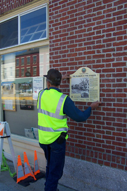 Hanging a panel, Thomaston, Maine